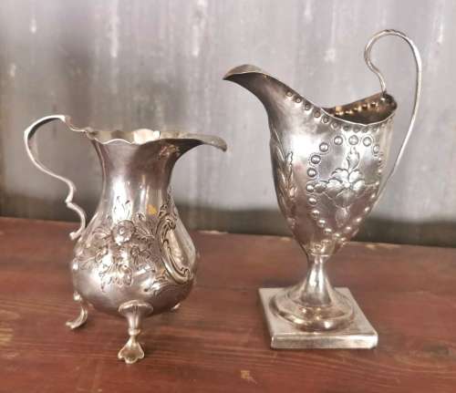 Two hallmarked silver jugs