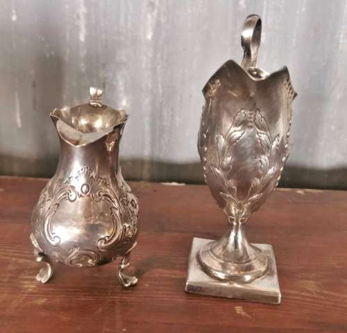 Two hallmarked silver jugs
