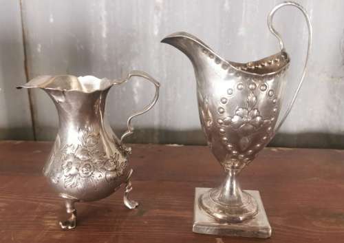 Two hallmarked silver jugs