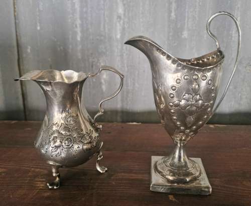 Two hallmarked silver jugs