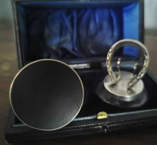 Boxed pair of hallmarked silver menu holders