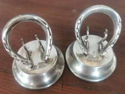 Boxed pair of hallmarked silver menu holders