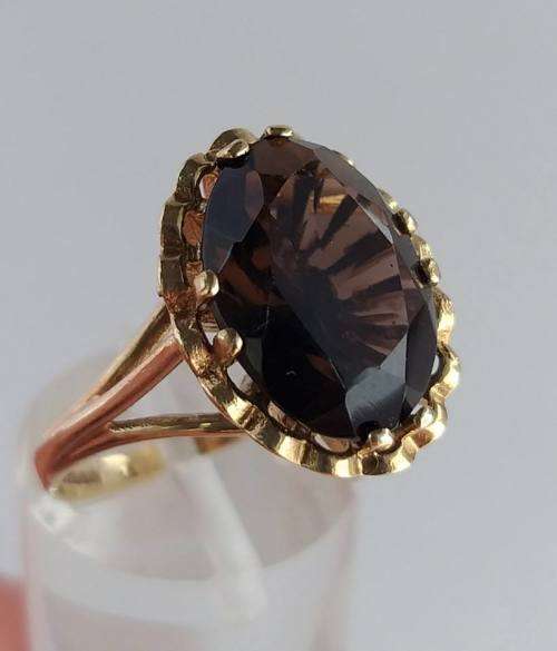 9 carat gold ring set with large rich brown topaz (1970s)