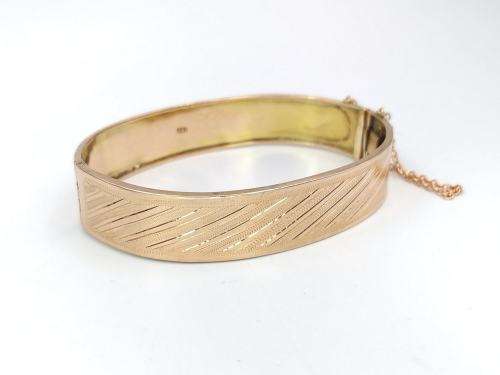 Spectacular 9ct rose gold hinged bangle (solid)