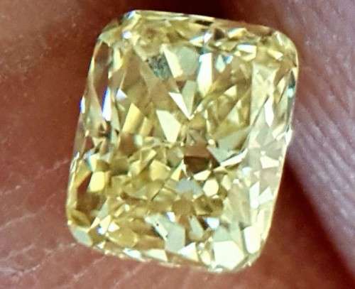 Certified 0.53 Fancy Yellow VVS2 Cushion  Natural Diamond