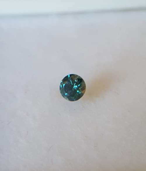 CERTIFIED 0.071Cts ROUND DIAMOND VS1