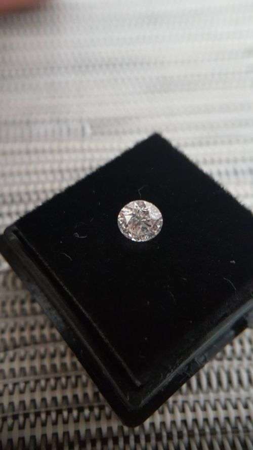 Certified 0.57 Carat G SI2 Round Brilliant  Natural Diamond