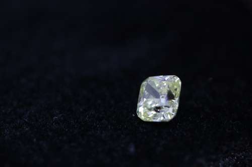 Cert 0.53 Fancy Yellow VS1 Cushion Natural Diamond