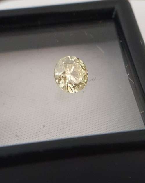 Cert 0.50Cts Fancy Yellow SI1 Round Brilliant Natural Diamond