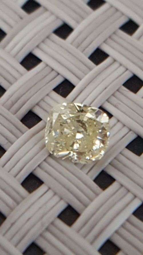 Cert 0.62Cts Fancy Yellow SI2 Cushion Natural Diamond