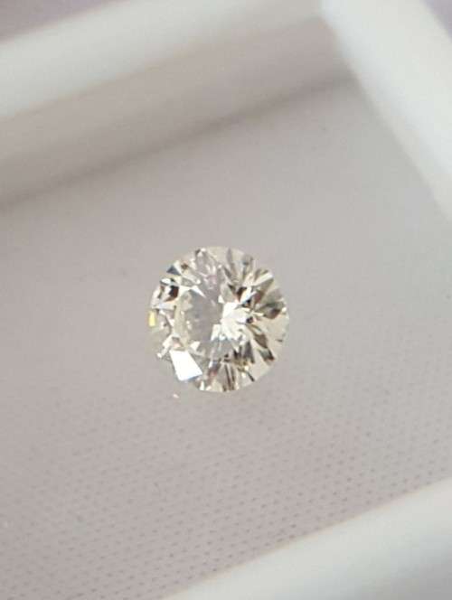 Certified 0.48 Carat K VS2 Round Brilliant Natural Diamond