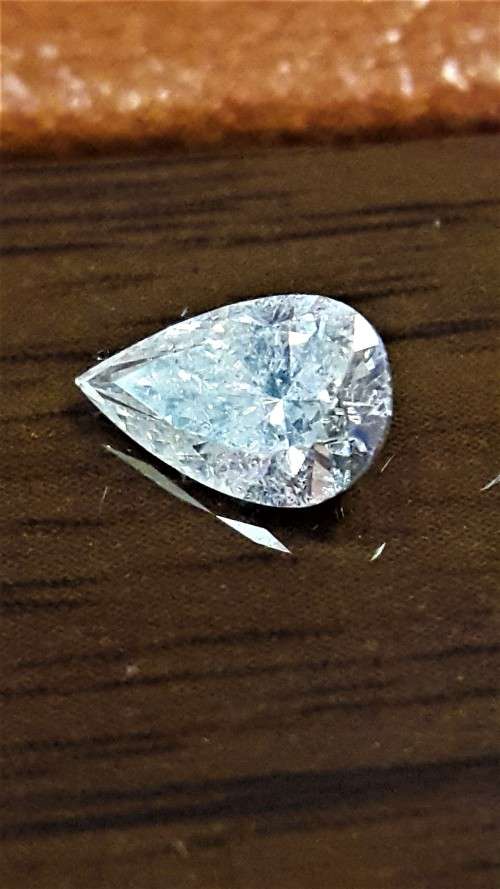 Certified 0.71Cts Fancy White Diamond Pear Shaped
