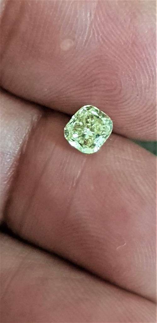 Certified 0.60Cts Diamond Yellow Cushion Cut