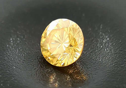 0.23 cts. CERTIFIED  Diamond Round SI1 Intense Yellow Colour  Natural