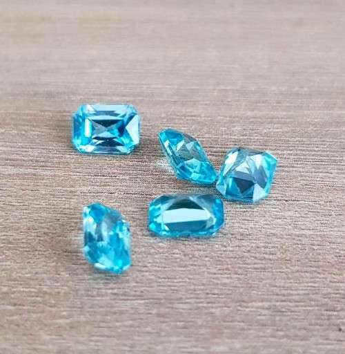 Topaz Swiss Blue  1.40Ct. Emerald Cut .Ravishing Color!