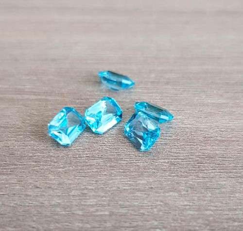 Topaz Swiss Blue  1.40Ct. Emerald Cut .Ravishing Color!