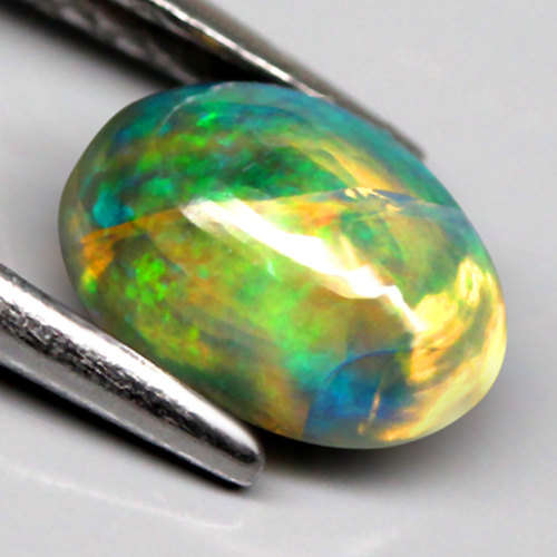 1.02Ct. Natural Opal Oval Cabochon Multi Colours Glittering Rainbow 3D! Ethiopian