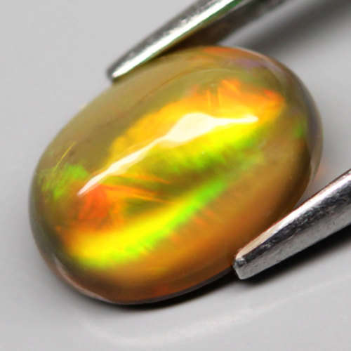 0.78Ct. Natural Opal Oval Cabochon Multi Colors Glittering Rainbow 3D! Ethiopian