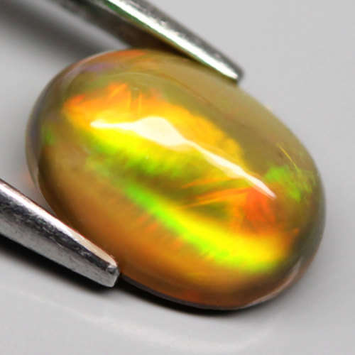 0.78Ct. Natural Opal Oval Cabochon Multi Colors Glittering Rainbow 3D! Ethiopian