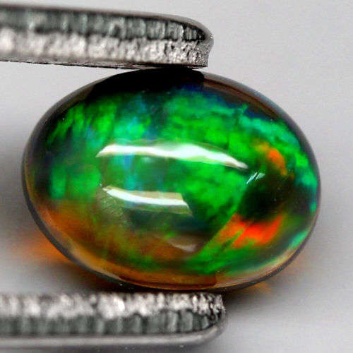 0.95Ct. Natural Opal Oval Cabochon Multi Colours Glittering Rainbow 3D! Ethiopian