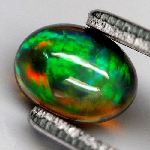 0.95Ct. Natural Opal Oval Cabochon Multi Colours Glittering Rainbow 3D! Ethiopian