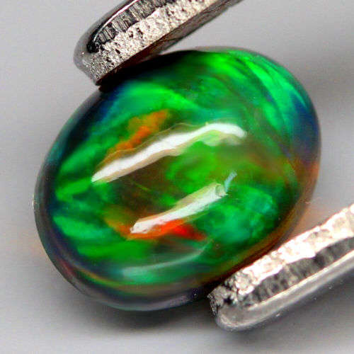 0.95Ct. Natural Opal Oval Cabochon Multi Colours Glittering Rainbow 3D! Ethiopian