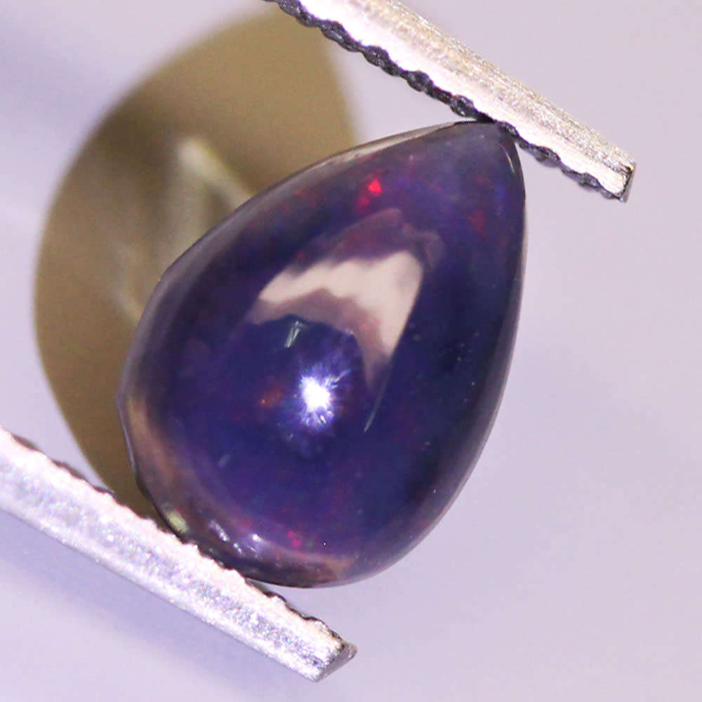 0.63Ct. Opal Pear Cabochon Multi Colours Glittering Rainbow 3D! Ethiopian Natural