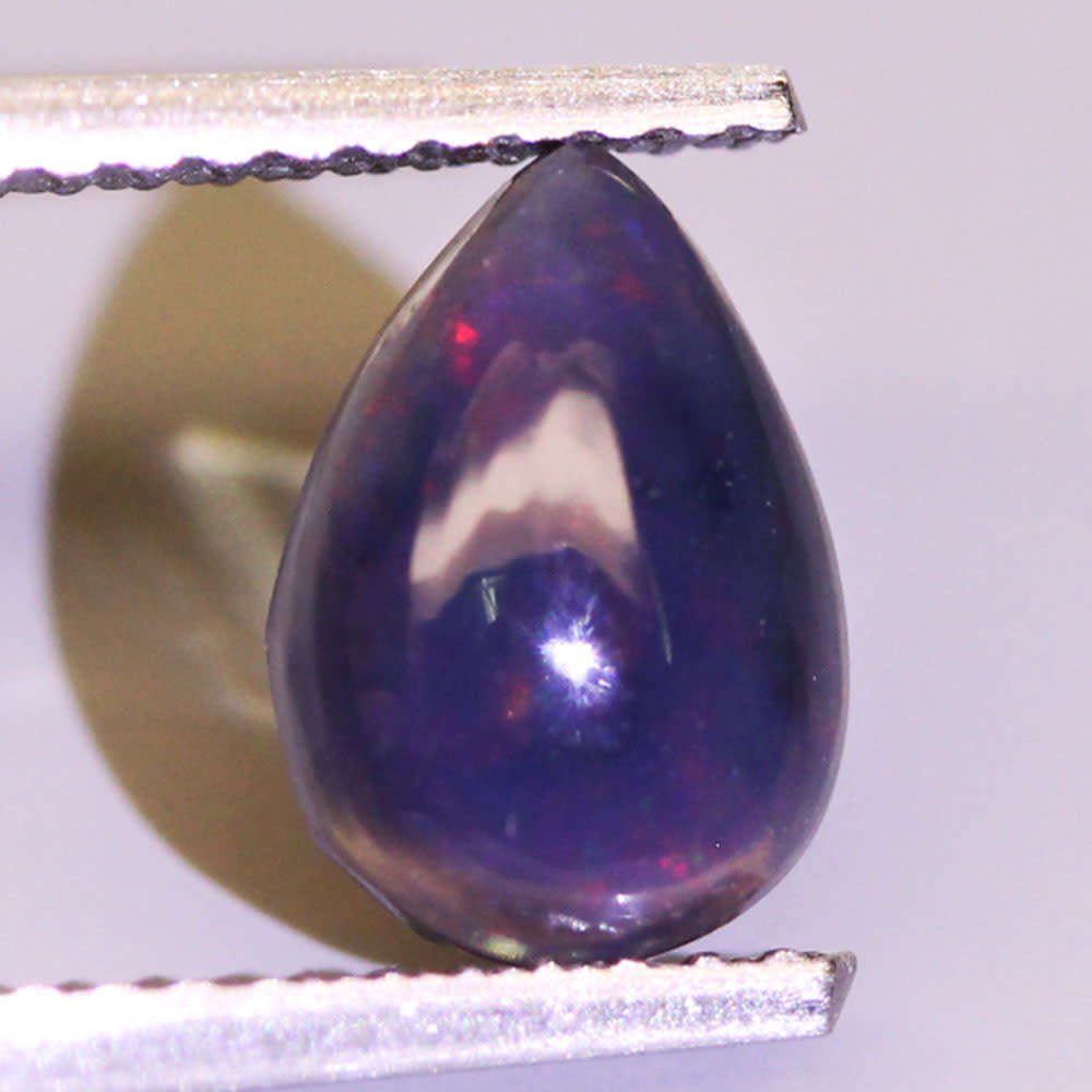 0.63Ct. Opal Pear Cabochon Multi Colours Glittering Rainbow 3D! Ethiopian Natural