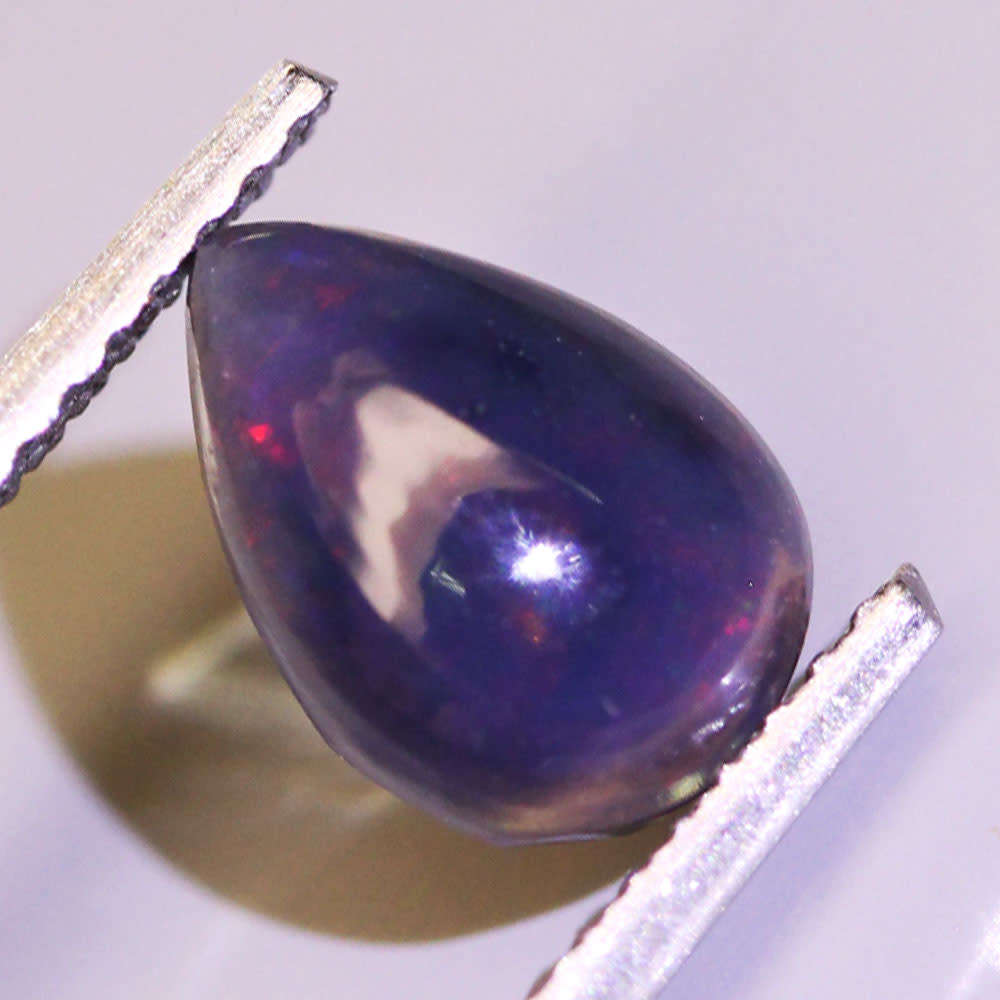 0.63Ct. Opal Pear Cabochon Multi Colours Glittering Rainbow 3D! Ethiopian Natural
