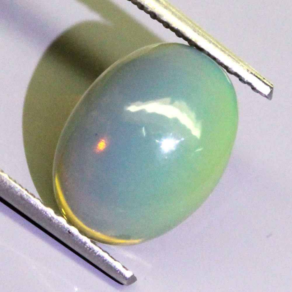 2.08Ct. Opal Oval Cabochon Yellow Multi Colours Gem Ravishing Ethiopian Natural