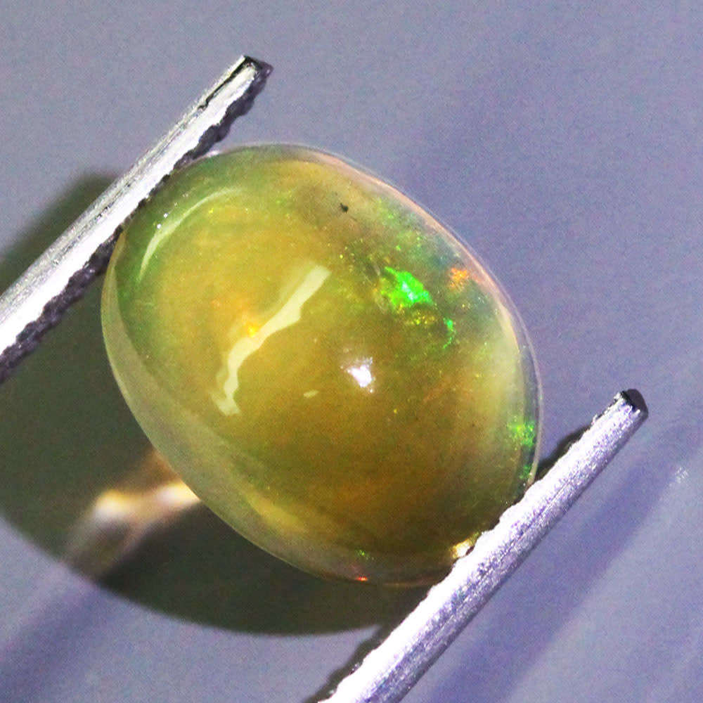 1.73Ct. Opal Oval Cabochon Multi  Colours Gem Ravishing Ethiopian Natural