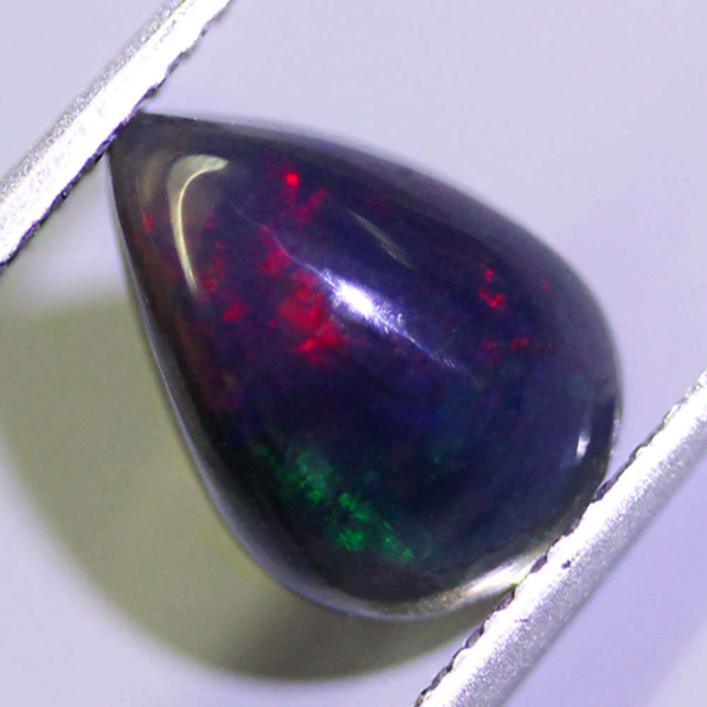 1.26Ct.  Opal Pear Cabochon Multi Colours Glittering Rainbow 3D! Ethiopian Natural