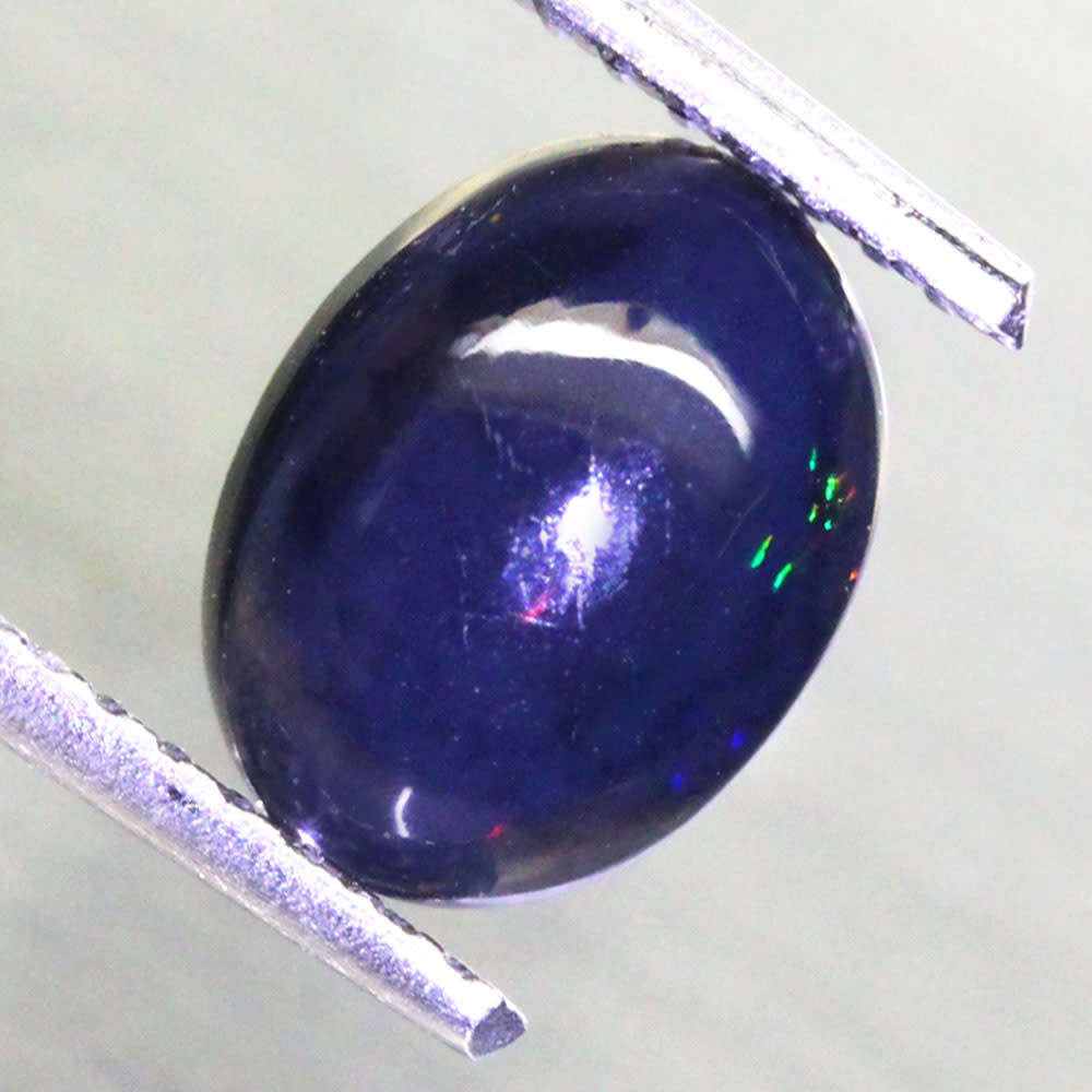 0.95Ct.  Opal Oval Cabochon Multi Colours Glittering Rainbow 3D! Ethiopian Natural