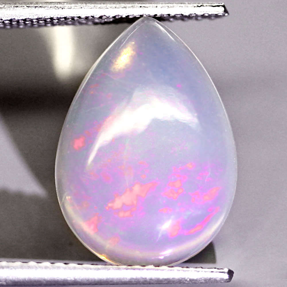 3.05Ct. Big Opal Pear Cabochon Multi Colorus Glittering Rainbow 3D! Ethiopian