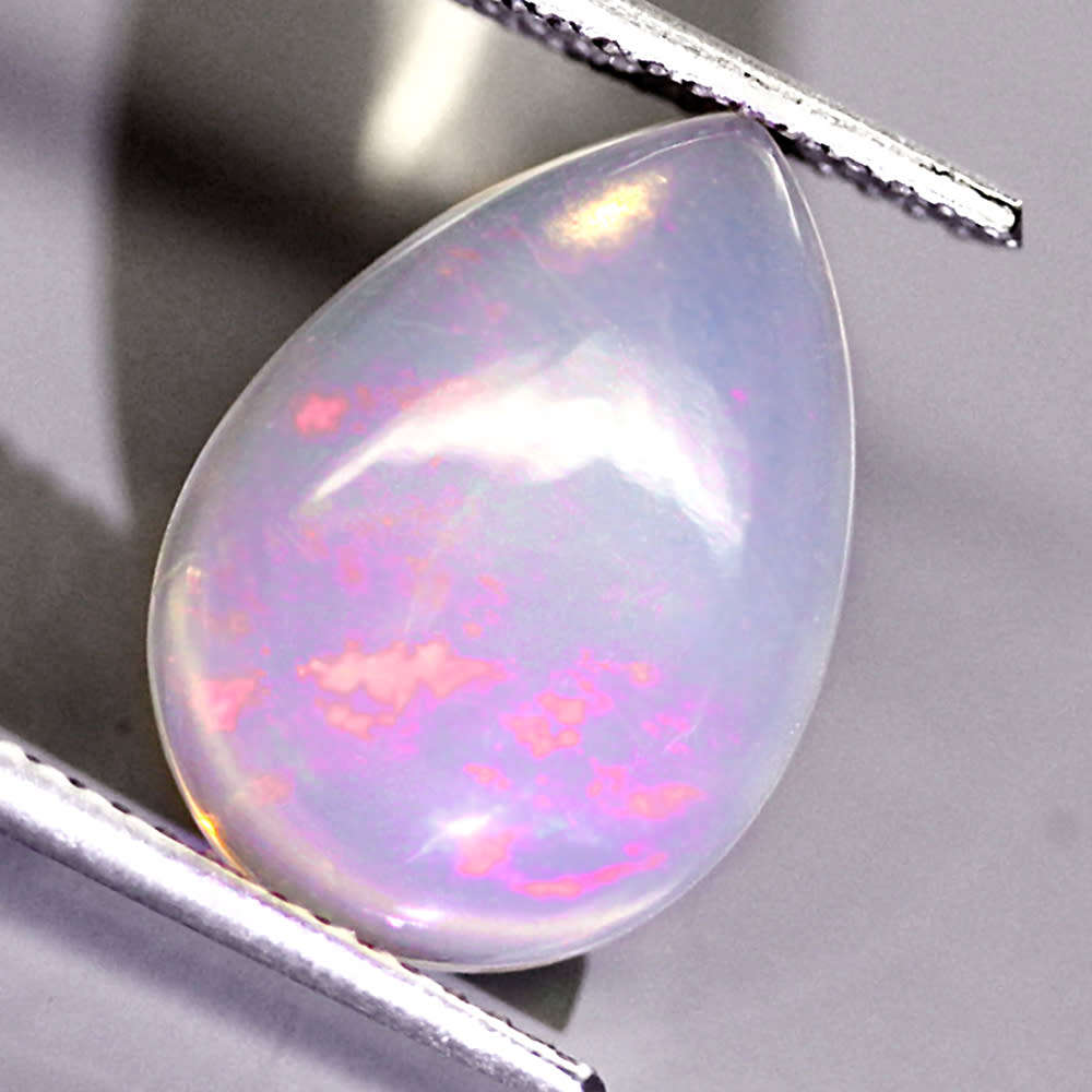 3.05Ct. Big Opal Pear Cabochon Multi Colorus Glittering Rainbow 3D! Ethiopian