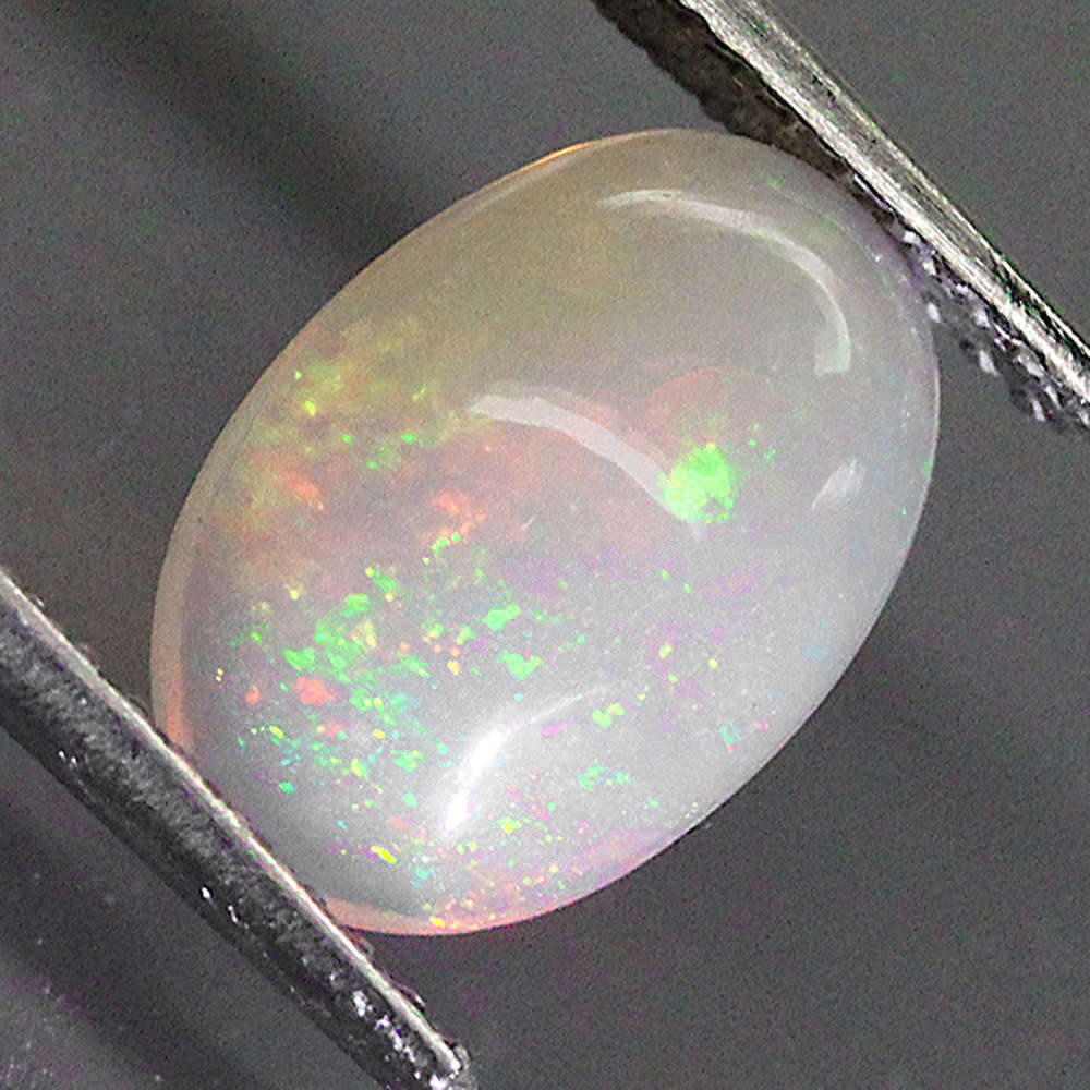1.51Ct. Opal Oval Cabochon Multi Colours Glittering Rainbow 3D! Ethiopian Natural