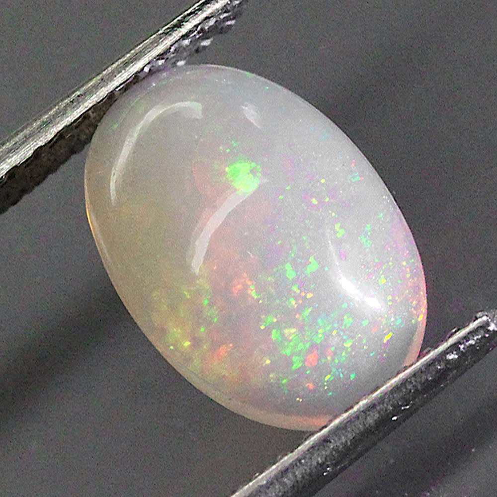 1.51Ct. Opal Oval Cabochon Multi Colours Glittering Rainbow 3D! Ethiopian Natural