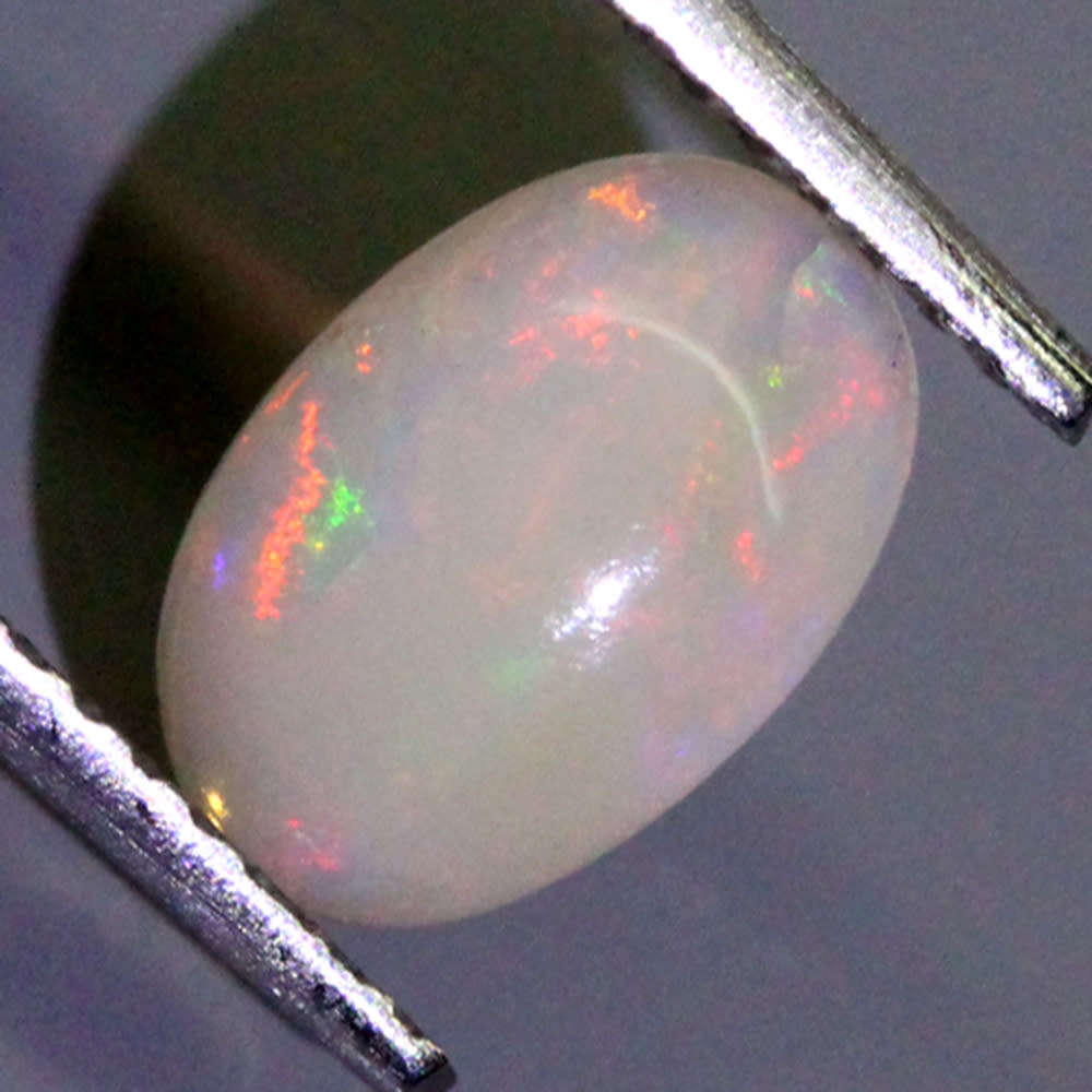 0.85Ct. Opal Oval Cabochon Multi Colours Glittering Rainbow 3D! Ethiopian Natural