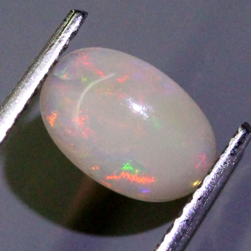0.85Ct. Opal Oval Cabochon Multi Colours Glittering Rainbow 3D! Ethiopian Natural