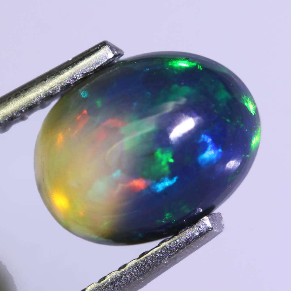 1.08Ct. Opal Green Violet Blue Multi Colours Oval Cabochon Ethiopian  Natural