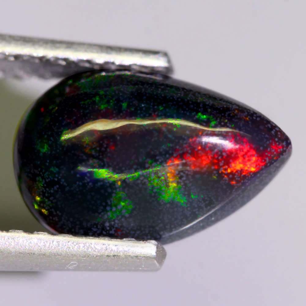 0.90Ct.  Opal Pear Cabochon  Multi Colours Glittering Rainbow 3D! Ethiopian Natural