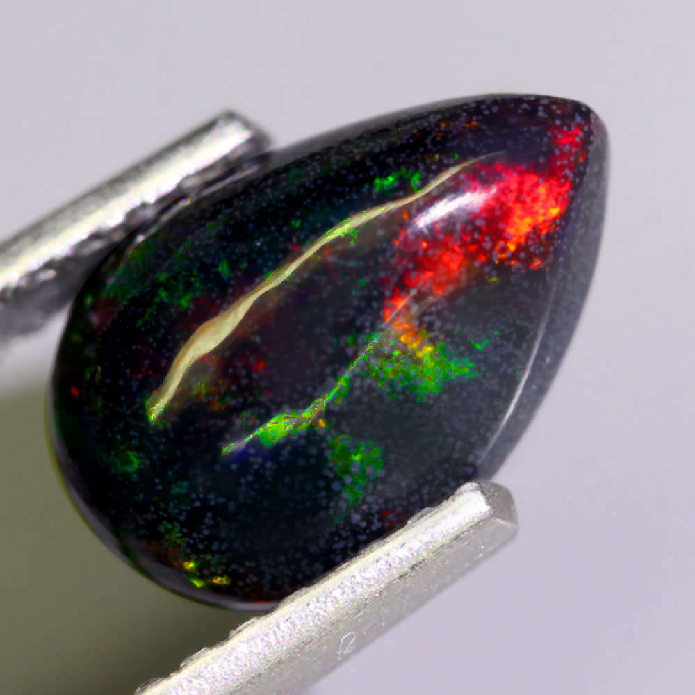 0.90Ct.  Opal Pear Cabochon  Multi Colours Glittering Rainbow 3D! Ethiopian Natural