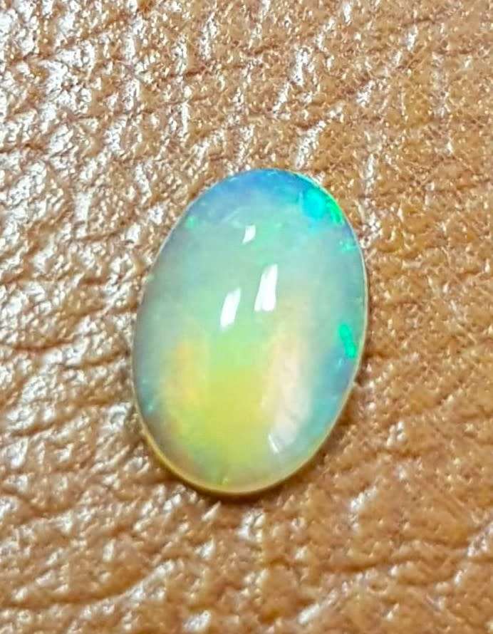 0.73Ct. Opal Oval Cabochon **Multi Colours**Glittering Rainbow 3D! Ethiopian Natural
