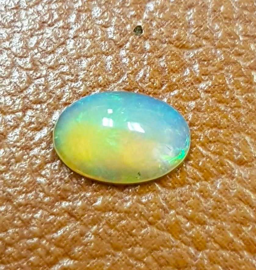 0.73Ct. Opal Oval Cabochon **Multi Colours**Glittering Rainbow 3D! Ethiopian Natural