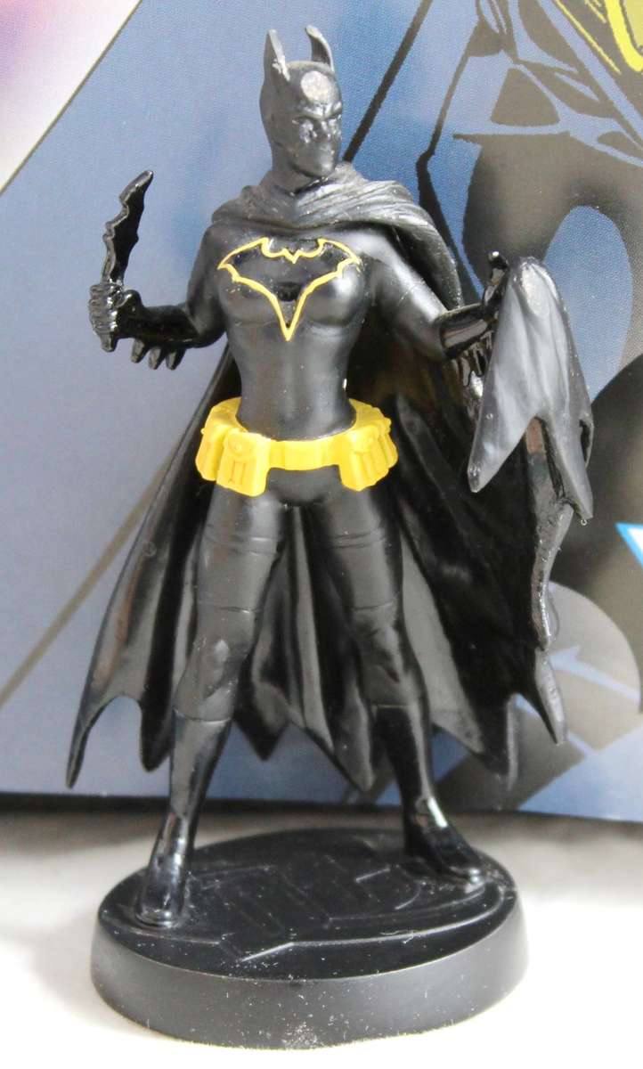 DC comics - lead, hand painted figurine with book - Batgirl #37