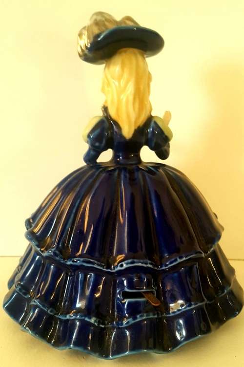 Must see musical figurine. Wind up with a crown and s stamp