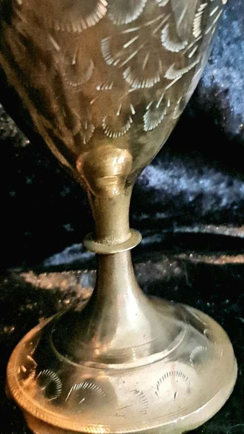 Very detailed brass vase.