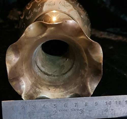 Very detailed brass vase.