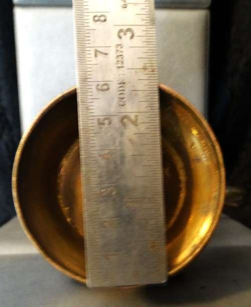 Beautiful set of etched vintage Indian teapots with intricate patterns.