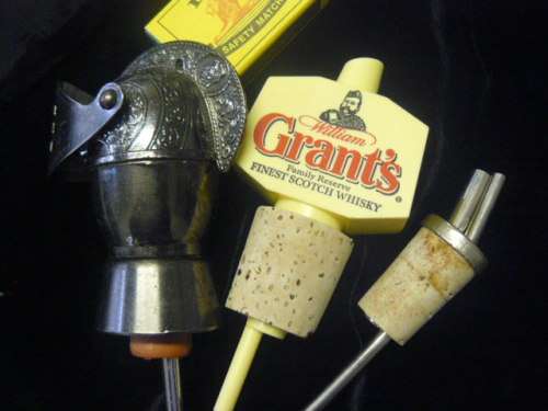 COLLECTION OF COLECTABLE BOTTLE TOP POURERS